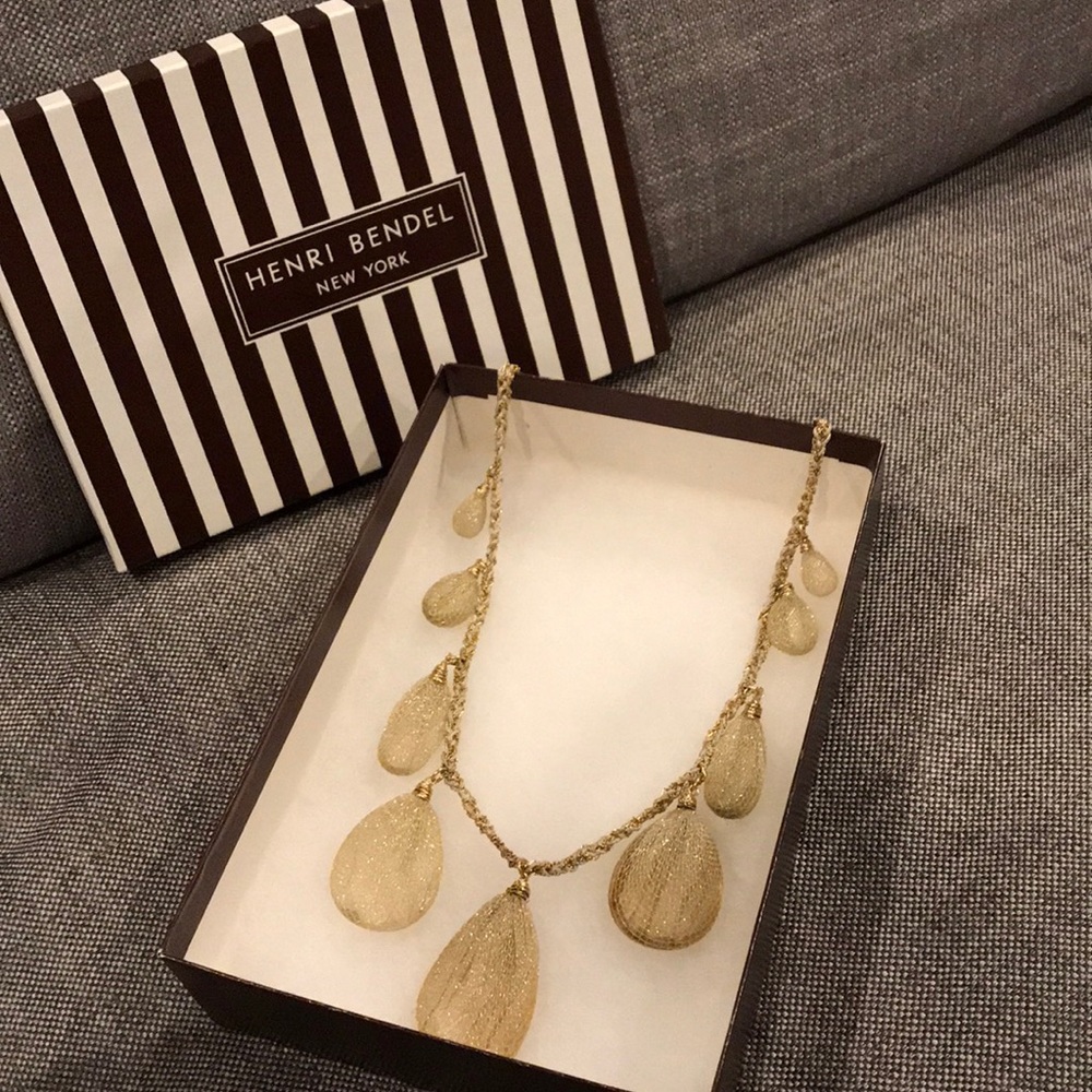 Quartz crystals in gold mesh necklace by Lee Angel